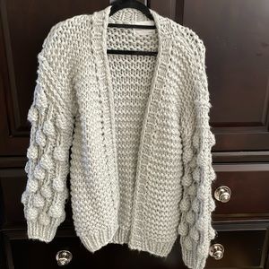 Knitted open cardigan